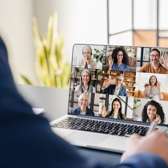 Businessman businessperson boss CEO freelancer tutor teacher calling having videocall conference meeting conversation online with colleagues on laptop. Remote work job, occupation on distance concept